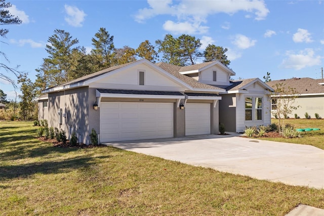 view of front of home featuring a garage and a front lawn