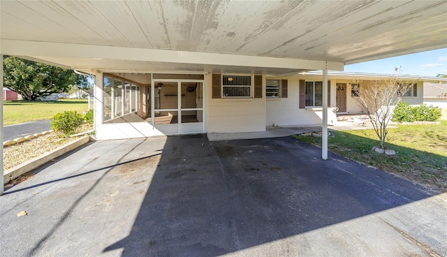 view of patio / terrace with a sunroom