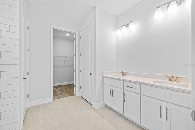 bathroom with vanity and tile patterned floors