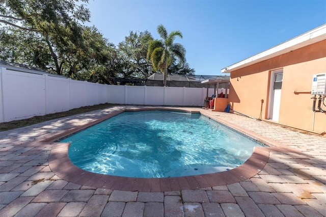 view of swimming pool featuring a patio