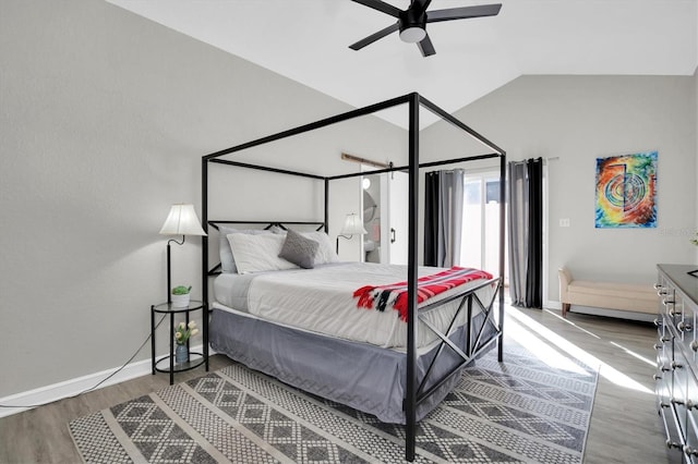 bedroom with lofted ceiling, hardwood / wood-style floors, access to exterior, and ceiling fan