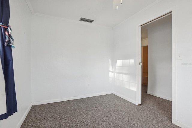 empty room with carpet floors and ornamental molding