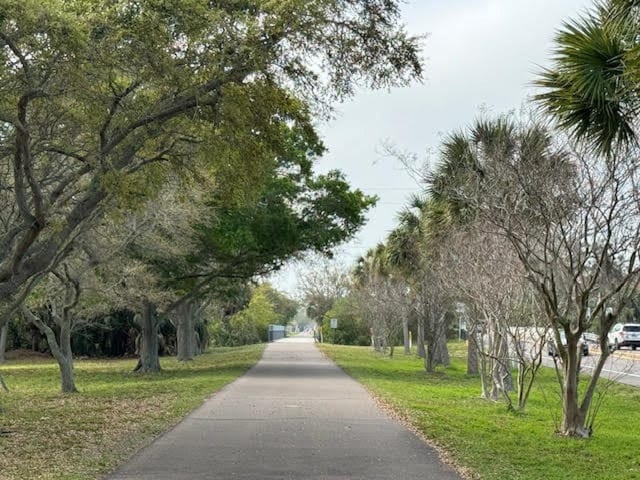 view of community featuring a lawn