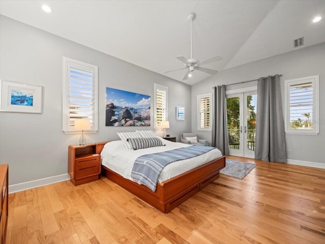 bedroom with light wood-type flooring, access to outside, ceiling fan, and lofted ceiling