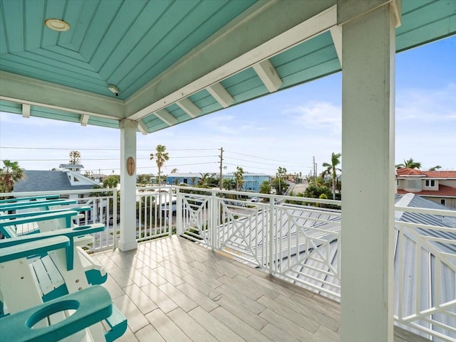 view of patio featuring a balcony