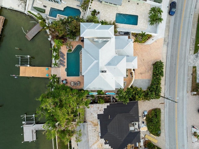 drone / aerial view with a water view