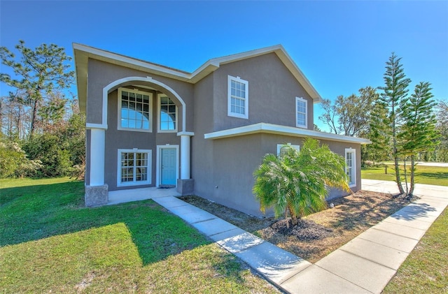 view of front of house with a front yard