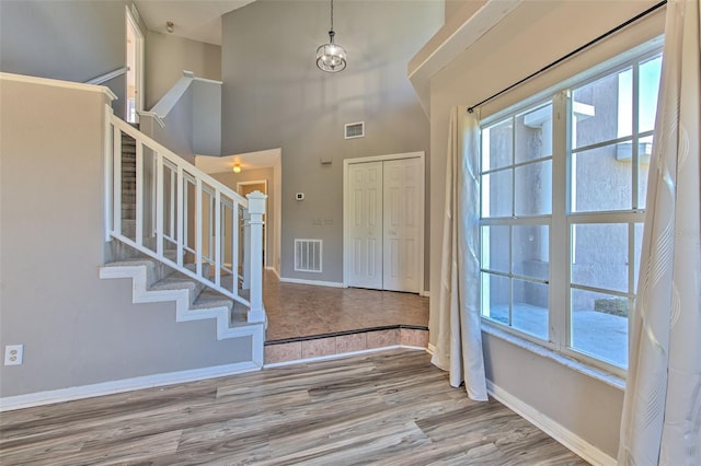 foyer entrance with hardwood / wood-style floors