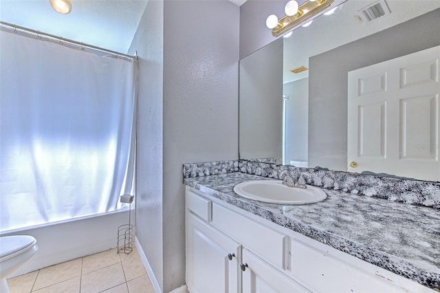 full bathroom with tile patterned flooring, vanity, shower / bath combination with curtain, and toilet