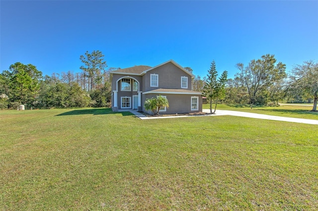 view of front facade with a front lawn