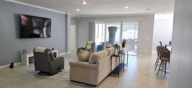 tiled living room with a textured ceiling and crown molding