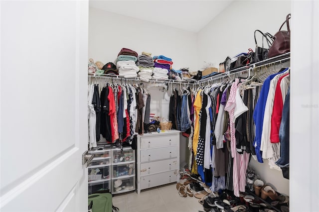 walk in closet featuring light tile patterned floors