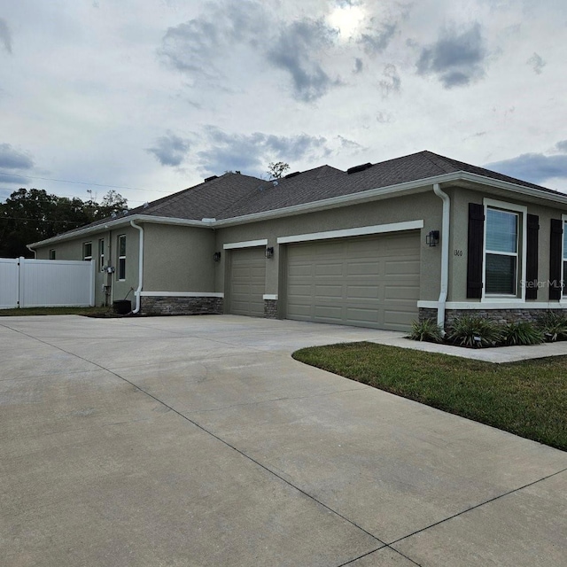 view of property exterior featuring a garage