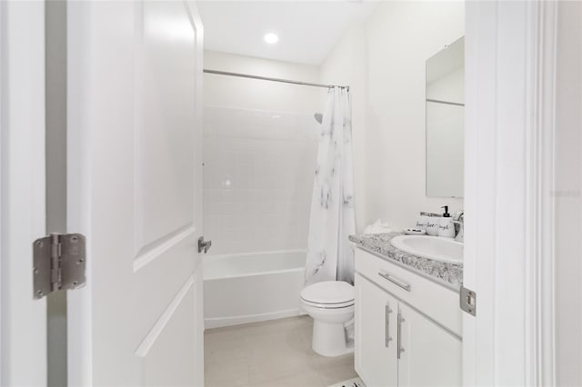 full bathroom featuring tile patterned flooring, vanity, shower / bath combination with curtain, and toilet