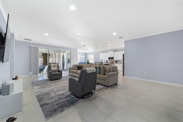 living room featuring light tile patterned flooring