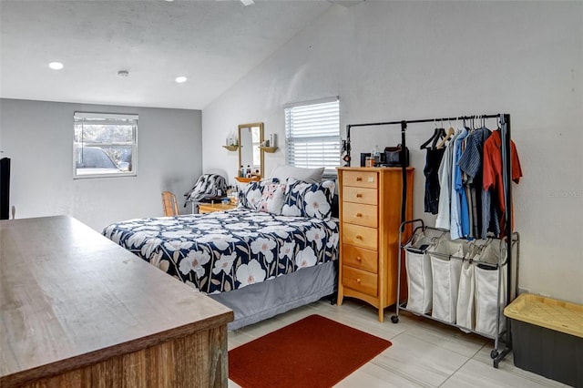 tiled bedroom with vaulted ceiling