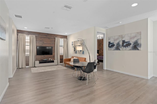 dining area with light hardwood / wood-style floors