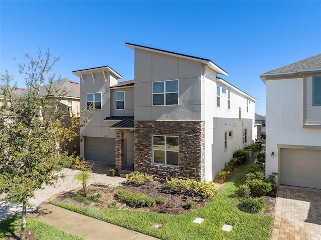 view of front of home with a garage