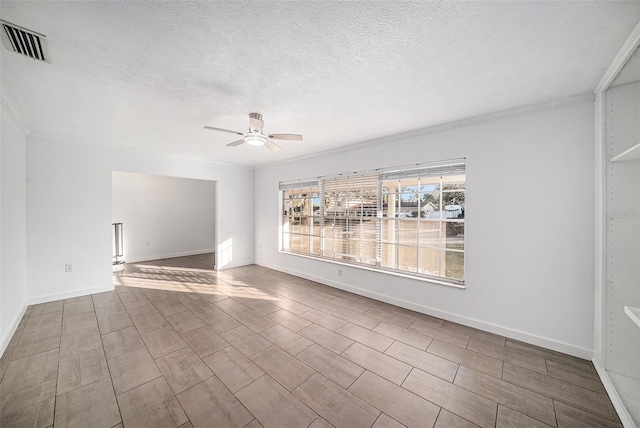 unfurnished room featuring hardwood / wood-style floors, ceiling fan, and a textured ceiling