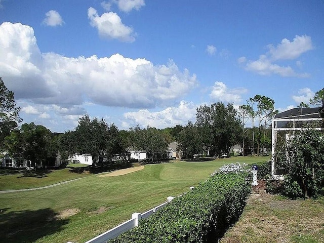 view of community featuring a lawn