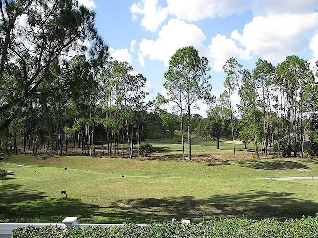 view of home's community featuring a yard