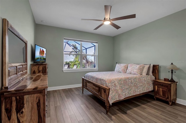 bedroom featuring ceiling fan and hardwood / wood-style flooring