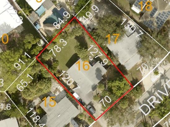 3863 Belle Vista Dr E, St Pete Beach, FL 33706 - aerial overview of property's location featuring property parcel outlined