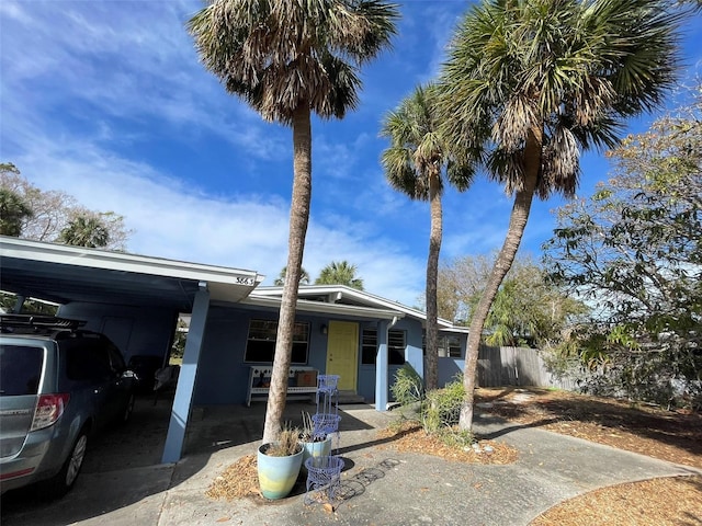 view of front of house featuring a carport