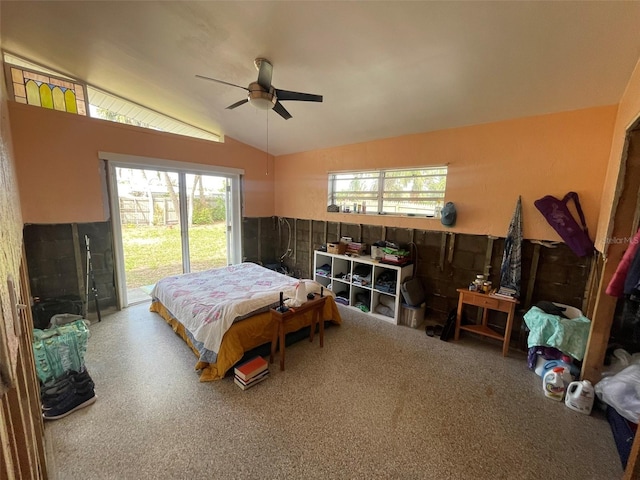 3863 Belle Vista Dr E, St Pete Beach, FL 33706 - bedroom with multiple windows, vaulted ceiling, and a ceiling fan