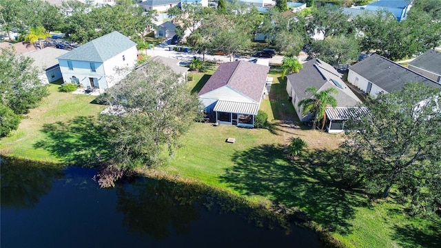 drone / aerial view with a water view