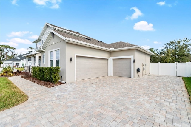 view of property exterior featuring a garage