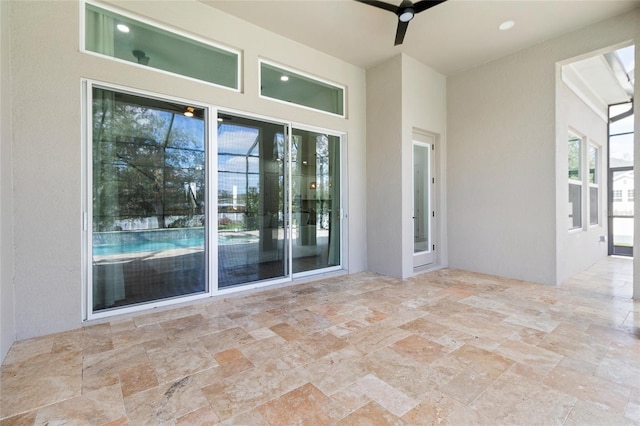 exterior space with a patio area and ceiling fan