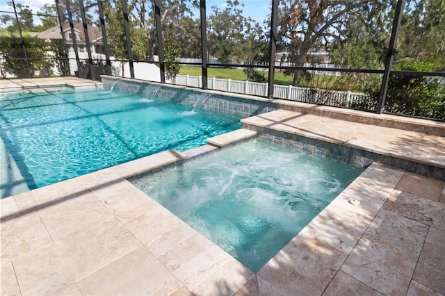 view of swimming pool with pool water feature