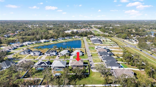 birds eye view of property featuring a water view