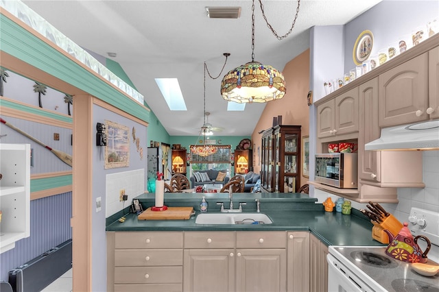 kitchen with tasteful backsplash, lofted ceiling with skylight, sink, decorative light fixtures, and white range with electric cooktop