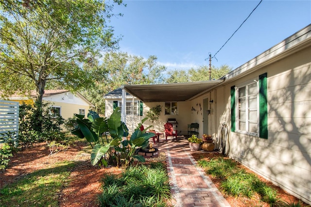 view of yard with a carport