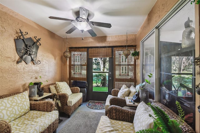 interior space featuring ceiling fan