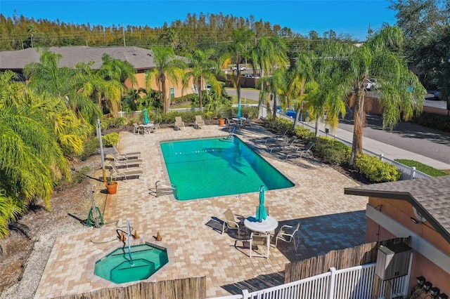 view of pool featuring a patio