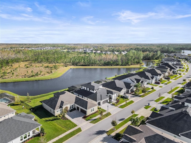 aerial view featuring a water view and a residential view