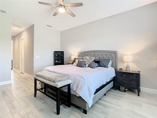 bedroom featuring visible vents, baseboards, and ceiling fan