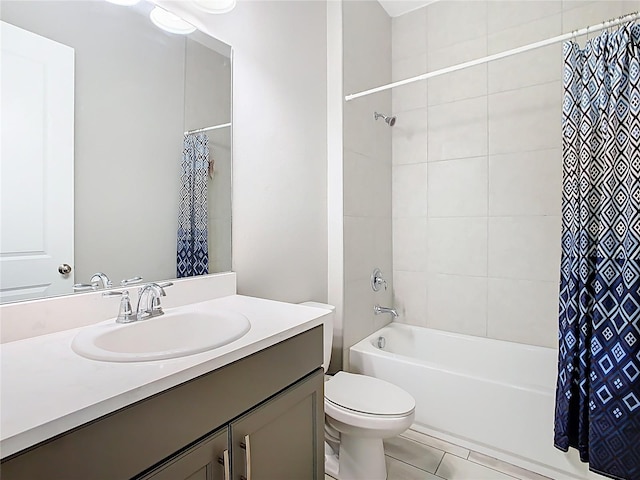 full bathroom with shower / bathtub combination with curtain, toilet, and vanity