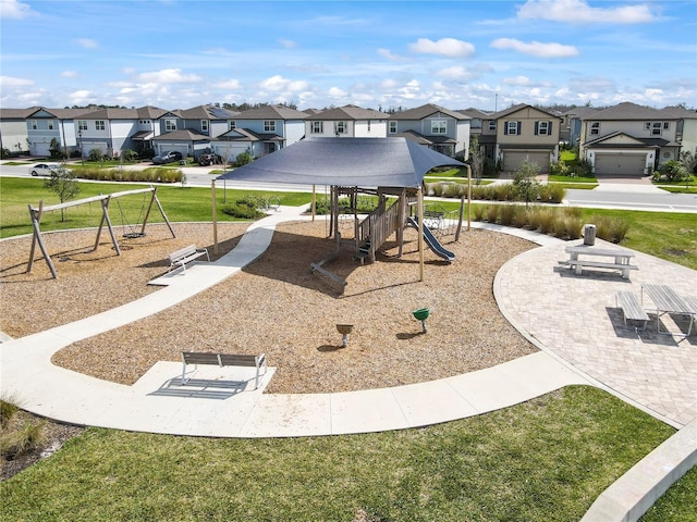 view of home's community with playground community and a residential view