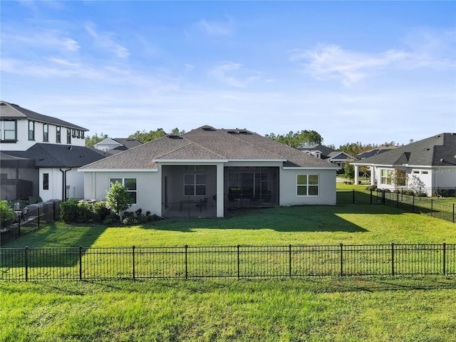 3901 Tour Trce, Land O Lakes, FL 34638 - rear view of house with a sunroom, a shingled roof, and stucco siding