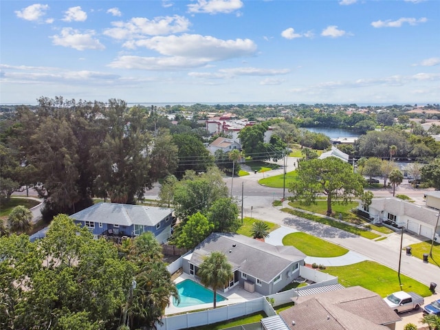 birds eye view of property with a residential view