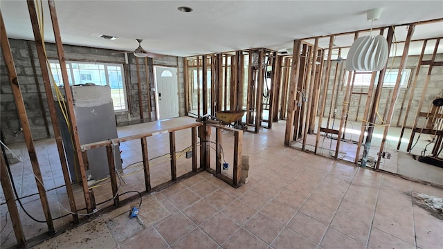 misc room featuring tile patterned floors and visible vents