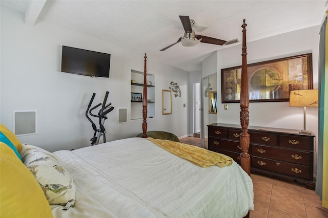 bedroom with visible vents, ceiling fan, and light tile patterned floors