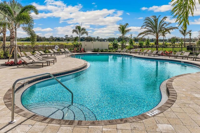 16026 10th Ave E, Bradenton, FL 34212 - community pool featuring a patio area