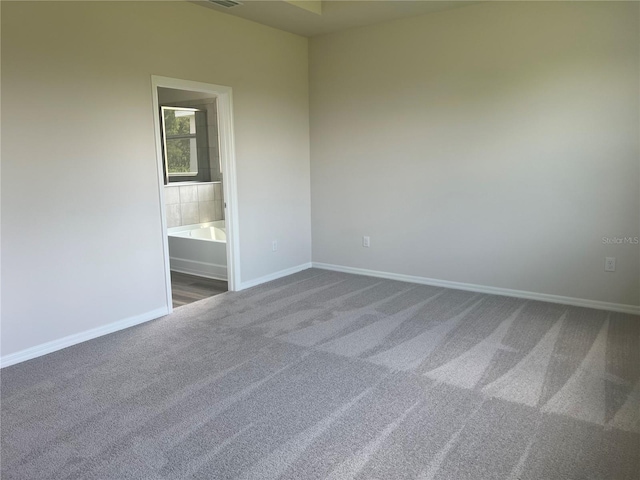 16026 10th Ave E, Bradenton, FL 34212 - spare room with carpet and baseboards