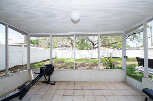 unfurnished sunroom with a healthy amount of sunlight