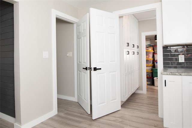 hallway featuring light hardwood / wood-style flooring